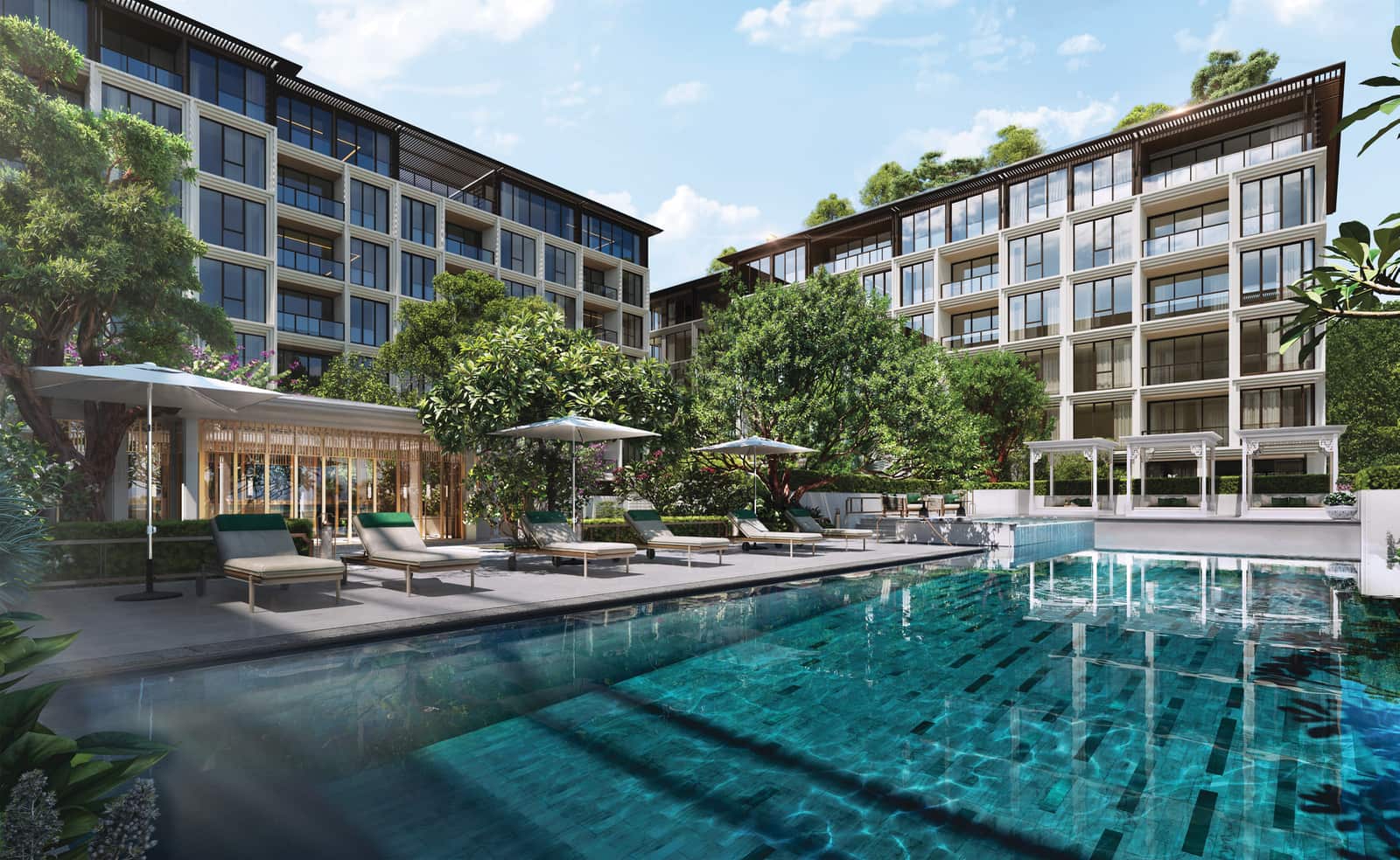 Computer-generated render of the pool terrace at The Residences at InterContinental Phuket Resort, Kamala, with sun loungers between the two residential buildings